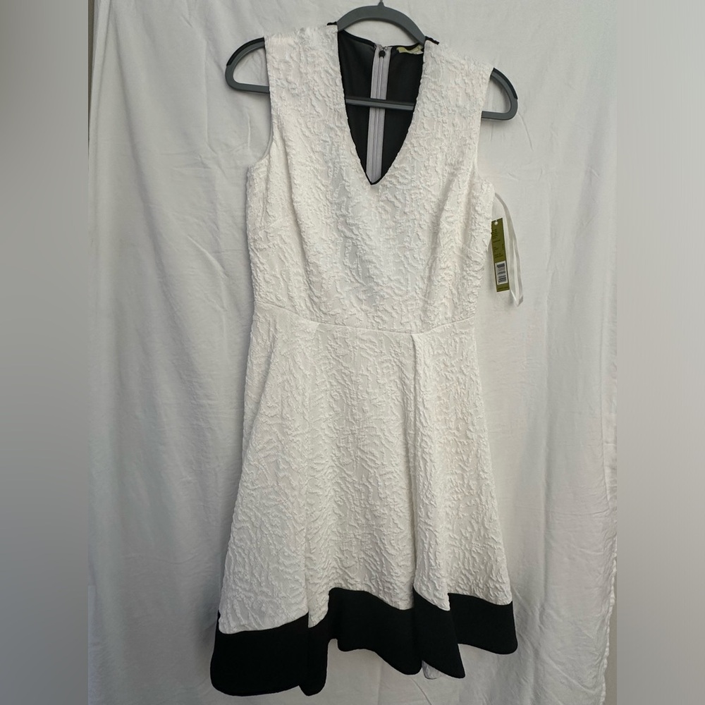 Beautiful black and white Gianni Bini dress, flowing, mesh black back to waist